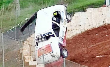 Alex Kuzmanovic rolls over and heads towards the retaining wall during the second heat of the Junior Sedans. The female driver escaped injury but was a little sore the day after. Alex Kuzmanovic rolls over and heads towards the retaining wall during the second heat of the Junior Sedans. The female driver escaped injury but was a little sore the day after.